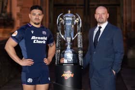 Scotland captain Sione Tuipulotu and head coach Gregor Townsend pose with the Six Nations trophy during the championship launch in Edinburgh on January 26, 2026. (Photo by LESLEY MARTIN / AFP via Getty Images)