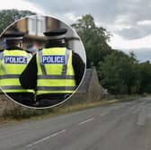 The A71 is closed at Dalmahoy Road after a single car crash.