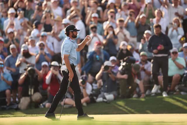 Cameron Young reacts on the 18th green after winning The Players Championship at TPC Sawgrass