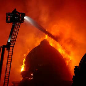Firefighters tackle the raging inferno that consumed the Union Corner building in Glasgow (Picture: Jeff J Mitchell)
