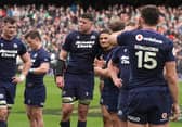 Scotland's Grant Gilchrist (centre) and captain Sione Tuipulotu console each other after the defeat by Ireland in the Guinness Six Nations match at the Aviva Stadium in Dublin.