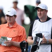 Bob MacIntyre and caddie Mike Burrow talk tactics during the last round of The Players Championship