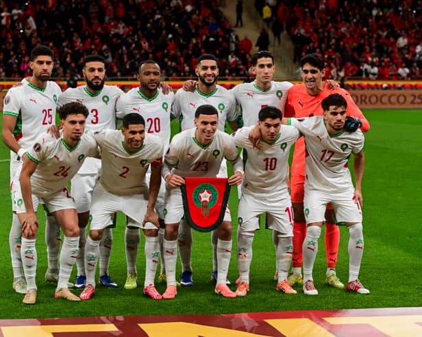 The Moroccan team pose for a group photo ahead of the African Cup of Nations final against Senegal at Prince Moulay Abdellah Stadium in Rabat on January 18, 2026. (Photo by Issam Zerrok / Hans Lucas / AFP via Getty Images)