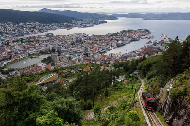 A view of Bergen and the funicular train making its way up Mount Fløyen.