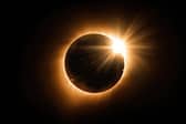 The 'diamond ring' phase of a solar eclipse.