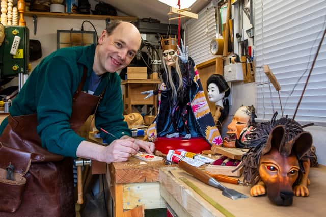 Marionette maker Stephen Foster in his workshop
