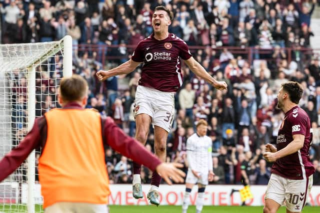 Oisin McEntee leapt highest to give Hearts a 1-0 win over Dundee at Tynecastle.