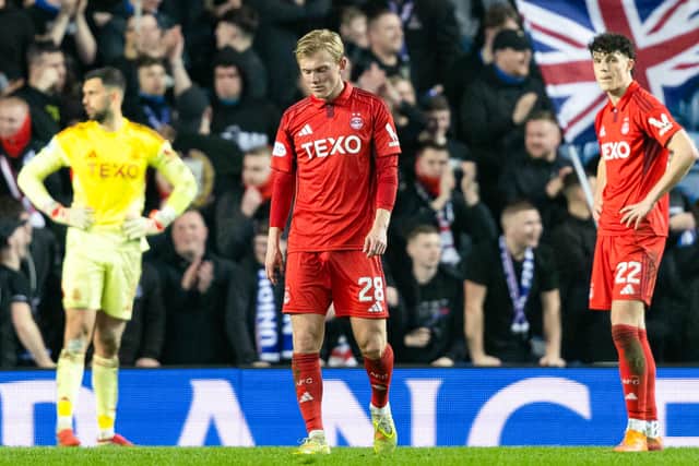 Aberdeen's dejected players say it all after being beaten soundly by Rangers.