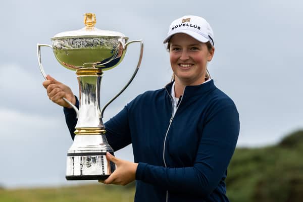 Lottie Woad shows off the trophy after winning last year’s ISPS HANDA Women’s Scottish Open on her professional debut