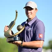 Matt Fitzpatrick poses with the trophy after winning the Valspar Championship at Copperhead Course at Innisbrook Resort and Golf Club in Florida