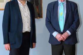 Neil Curtis, of Aberdeen University (left) is pictured with Magnus Linklater (right) and the Joan Eardley painting 'Andrew' . PIC Aberdeen University.