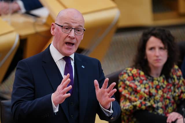 John Swinney during First Minister's Questions at the Scottish Parliament