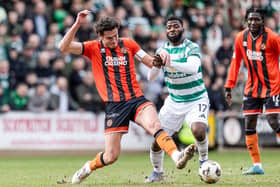 Celtic's Kelechi Iheanacho and Dundee United's Ross Graham battle for the ball at Tannadice on Sunday. Cr: SNS Group