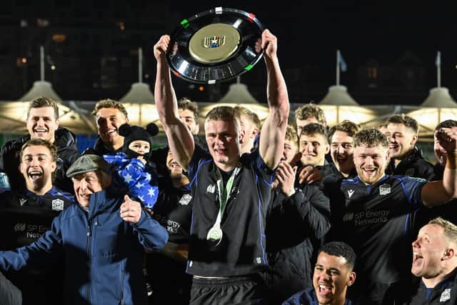 Glasgow Warriors' Fergus Watson lifts the Scottish-Italian Shield after the win over Benetton at Scotstoun.