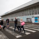 Low-cost zebra crossings - with no Belisha beacons - are already used at many airports and supermarket car parks.  Picture: Robert Perry / Getty Images.