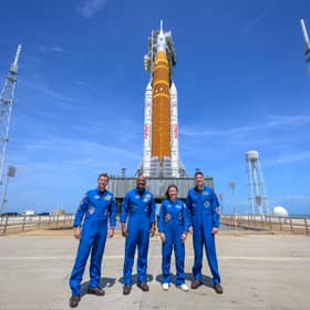 Astronauts Reid Wiseman, Artemis II commander, left, Victor Glover, Artemis II pilot, Christina Koch, Artemis II mission specialist, and CSA (Canadian Space Agency) astronaut Jeremy Hansen, Artemis II mission specialist, right, at NASA's Artemis II SLS (Space Launch System) rocket and Orion spacecraft ahead of launch. 