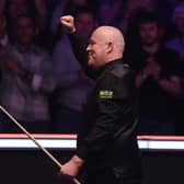 John Higgins got off to a winning start yesterday, beating old rival Mark Williams.