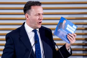 Scottish Conservative leader Russell Findlay with his party’s manifesto.