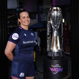 Rachel Malcolm, captain of Scotland, poses for a photo with the trophy during the Guinness Women's Six Nations launch.