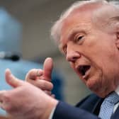 Donald Trump mimics firing a gun while talking about the Iran War in the White House this week (Picture: Kent Nishimura)