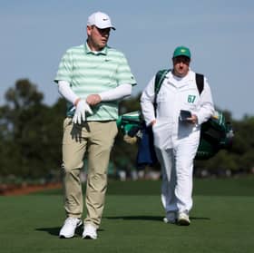 Bob MacIntyre and his caddie Mike Burrow walk to the first tee during a practice round on Wednesday at Augusta National Golf Club 