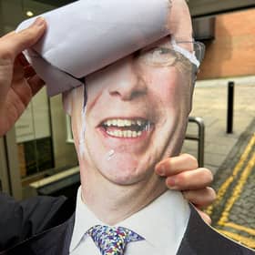 The horrifying moment Nigel Farage's face emerged from beneath John Swinney's.