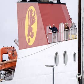 John Swinney waves from CalMac ferry MV Loch Seaforth as he arrives at Stornoway Harbour on Wednesday (Picture: Jane Barlow)