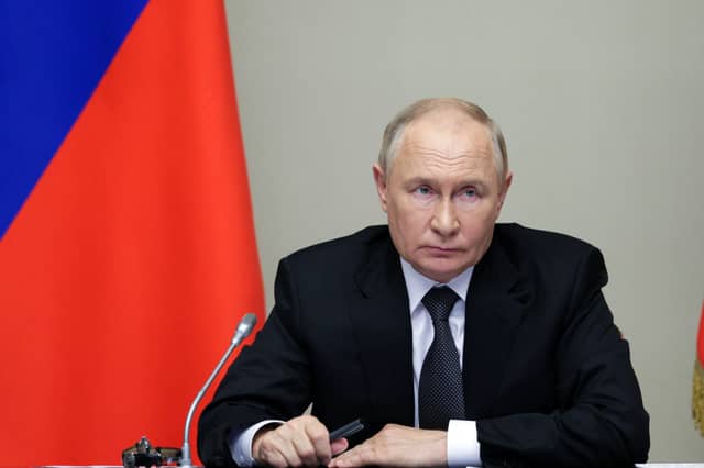 Vladimir Putin's regime is expert in 'hybrid warfare' techniques designed to weaken countries it regards as enemies (Picture: Gavriil Grigorov)