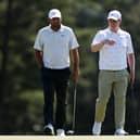 Scottie Scheffler and Bob  MacIntyre chat during the second round of the 2026 Masters Tournament at Augusta National Golf Club
