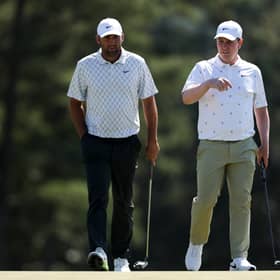 Scottie Scheffler and Bob  MacIntyre chat during the second round of the 2026 Masters Tournament at Augusta National Golf Club