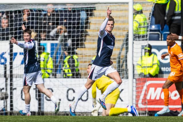Finn Yeats celebrates after doubling Falkirk's lead against Rangers