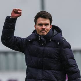 Danny Rohl clutches his fist in delight after guiding Rangers to a 6-3 victory over Falkirk 