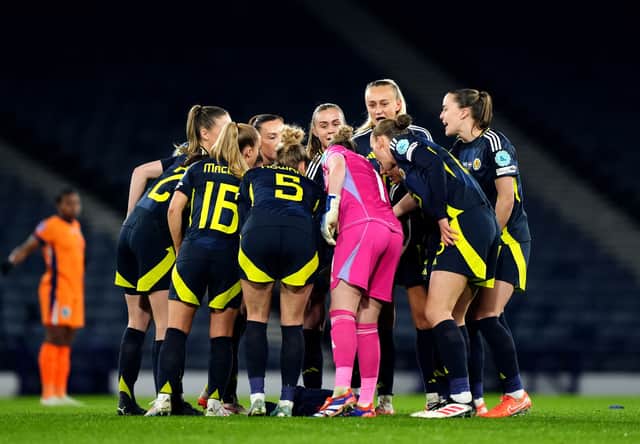 Scotland players huddle ahead of a UEFA Women's Nations League match at Hampden Park in Glasgow in February