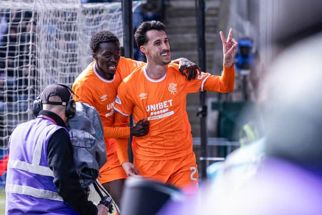 Bojan Miovski is congratulated by team-mate Mohamed Diomande after scoring his second goal in Rangers 6-3 Premiership win over Falkirk