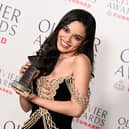 Rachel Zegler poses with the Best Actress In A Musical Olivier Award she won for 'Evita'.