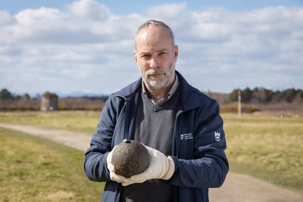 The National Trust of Scotland's Derek Alexander with the newly discovered mortar shell. Picture: NTS