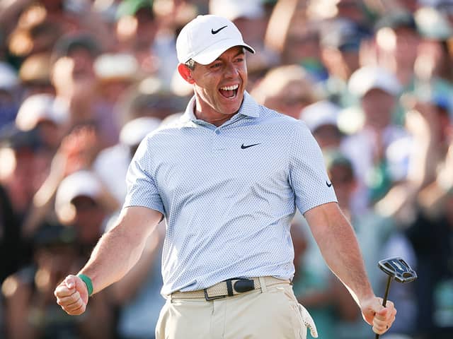 Rory McIlroy of Northern Ireland celebrates winning the 2026 Masters Tournament.