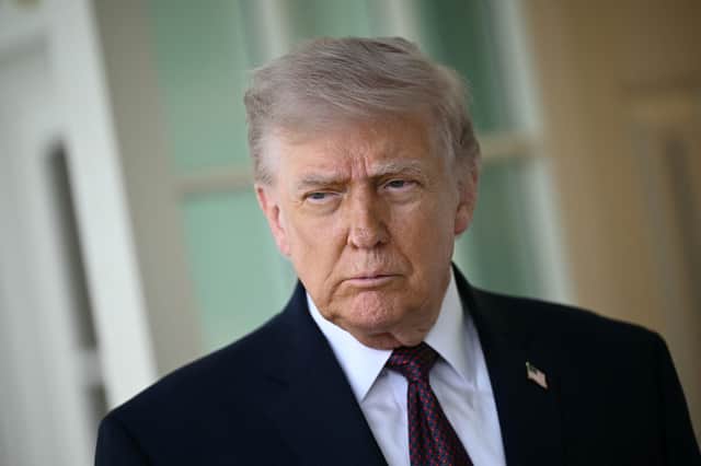 US President Donald Trump speaks to the press outside the Oval Office at the White House in Washington DC