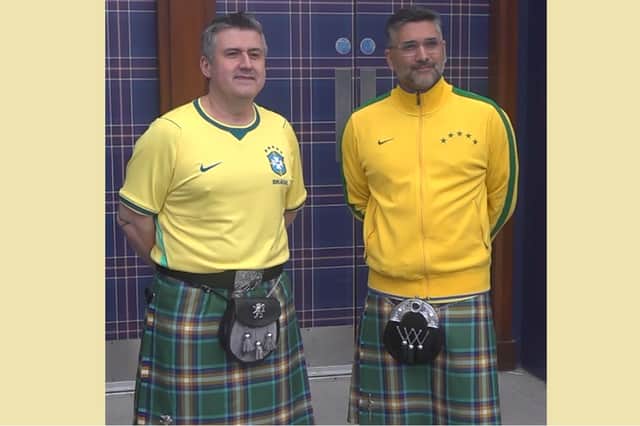 Faroque Hussain (right), and colleague wearing kilts made using Brazil's first-ever official tartan
