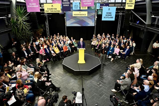 First Minister John Swinney at the launch of the SNP manifesto