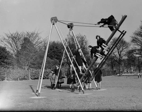 Children on swings at Beveridge Park, Kirkcaldy,  Fife, in April 1953