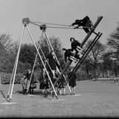 Children on swings at Beveridge Park, Kirkcaldy,  Fife, in April 1953