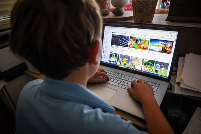 Children learn, play and socialise online, and enjoy many benefits from social media, messaging apps, gaming and other digital platforms – but they need to be safe (Picture: David Gray)