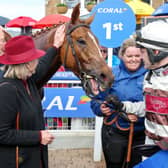 Sean Houlihan (right) celebrates after winning the Coral Scottish Grand National Handicap Chase aboard Kap Vert at Ayr.