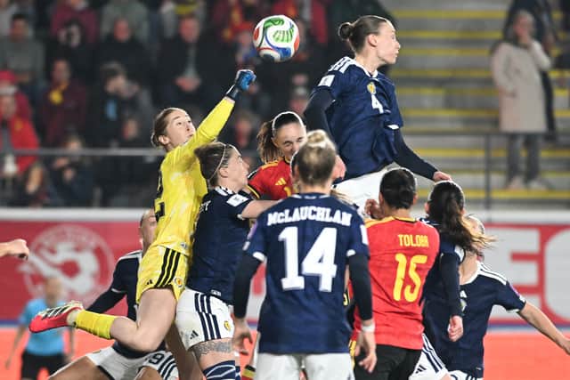 Scotland's goalkeeper Sandy MacIver punches the ball clear during the match against Belgium.