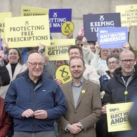 First Minister John Swinney with SNP candidates and activists in Dundee.