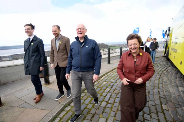 Scottish National Party candidates for Angus South, Lloyd Melville, and Dundee City East, Stephen Gethins, with party leader John Swinney and candidate for Dundee City West, Heather Anderson