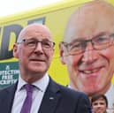 John Swinney with party activists in Edinburgh