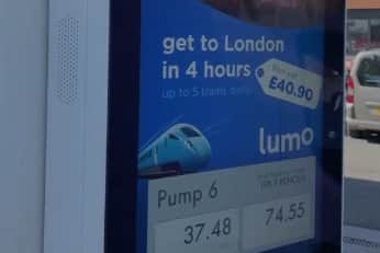 An Edinburgh petrol pump screen displaying the fuel cost and Lumo train fare