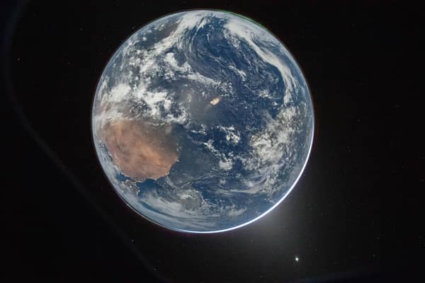 Knocking out and disrupting satellite communications will be a first step in future wars (Picture: Reid Wiseman)